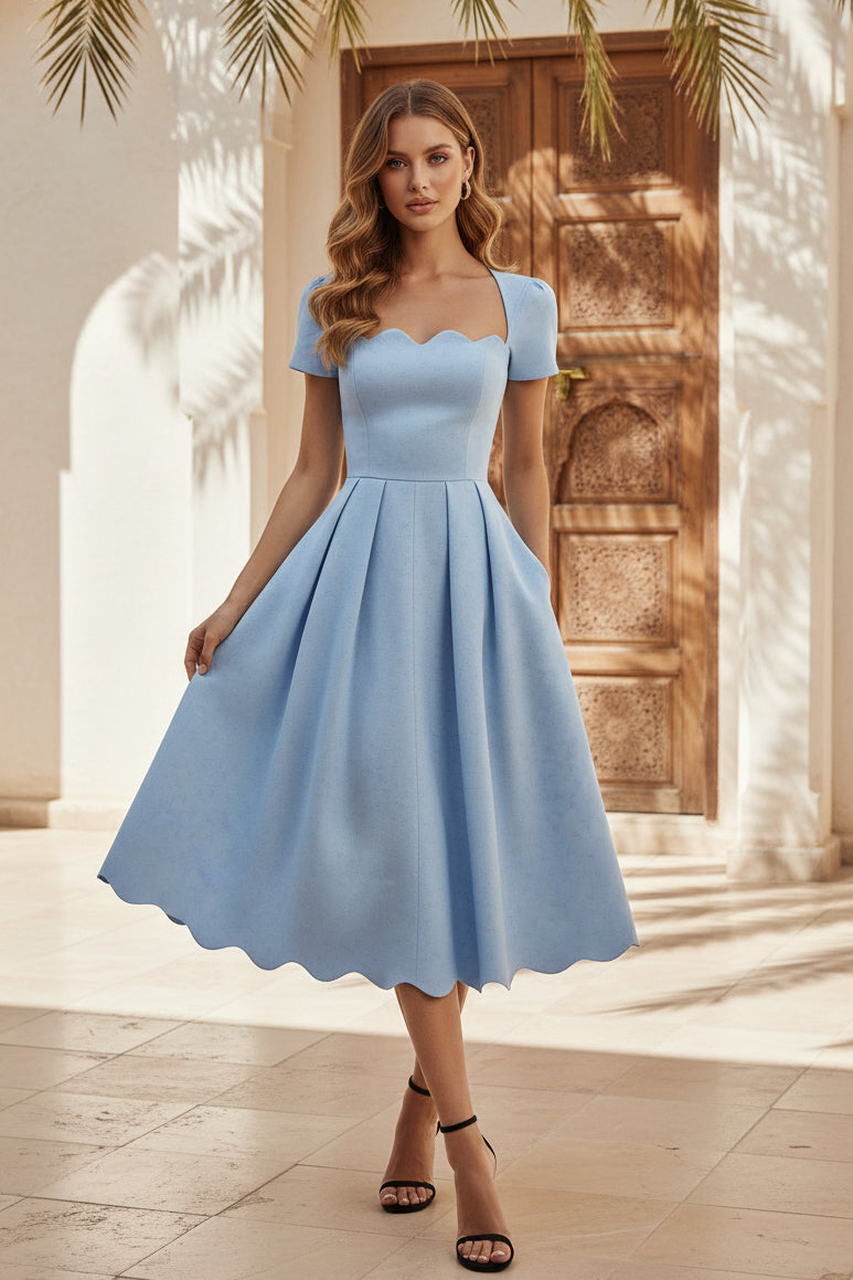 Gefaltetes Midikleid mit Wellenkante und Taschen